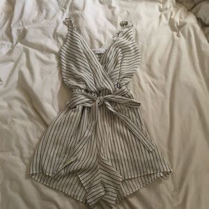 Small striped play suit worn twice